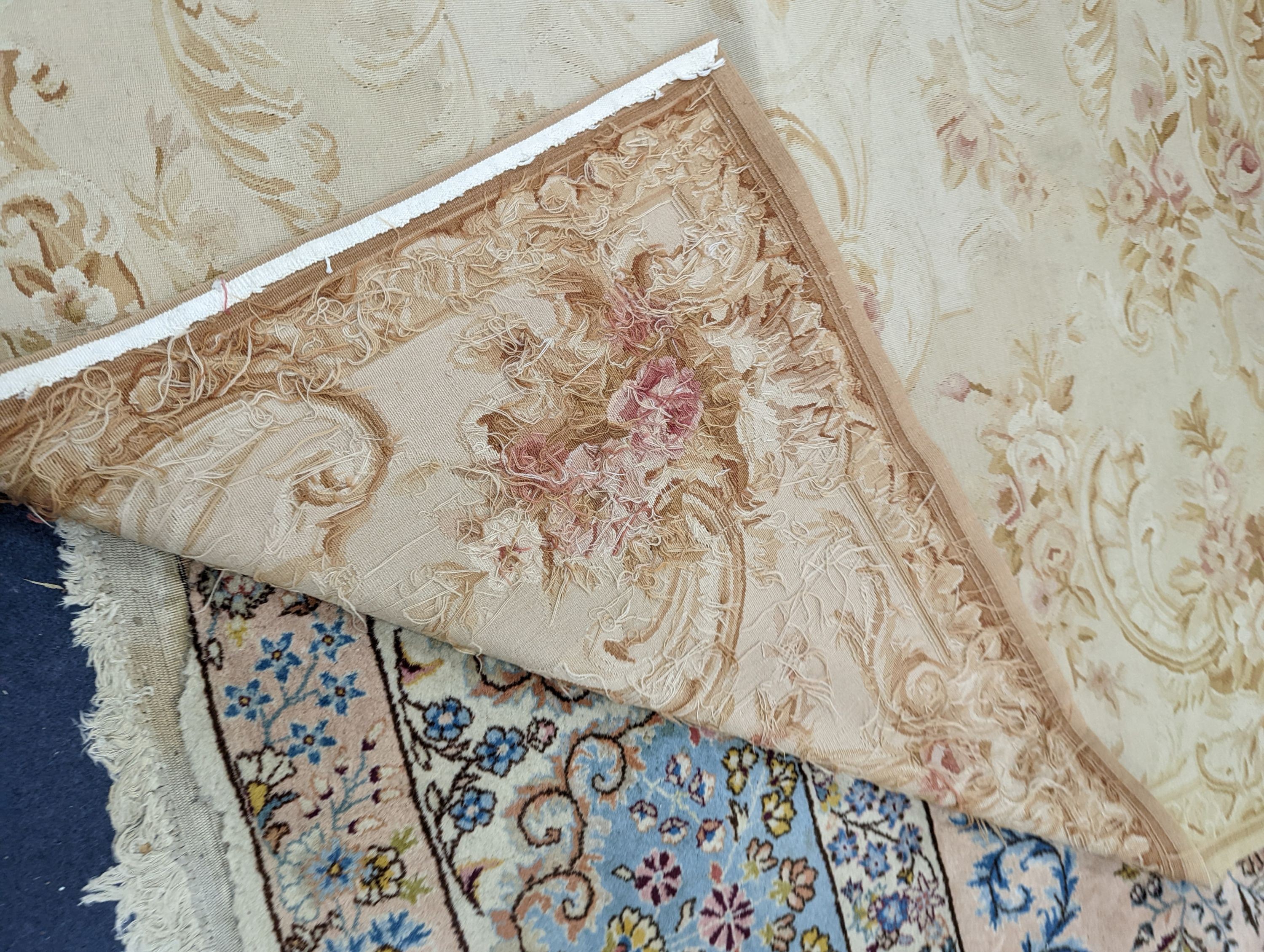 An Aubusson gold ground rug with rose pattern, 244 x 153cm